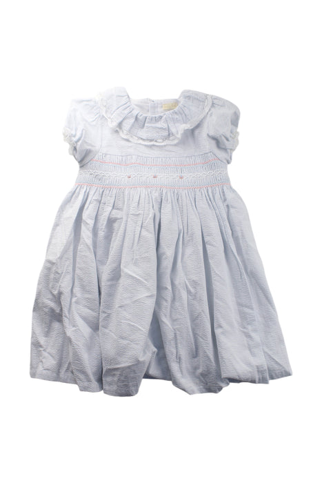 A White Short Sleeve Dresses from Baby Lai in size 5T for girl. (Front View)