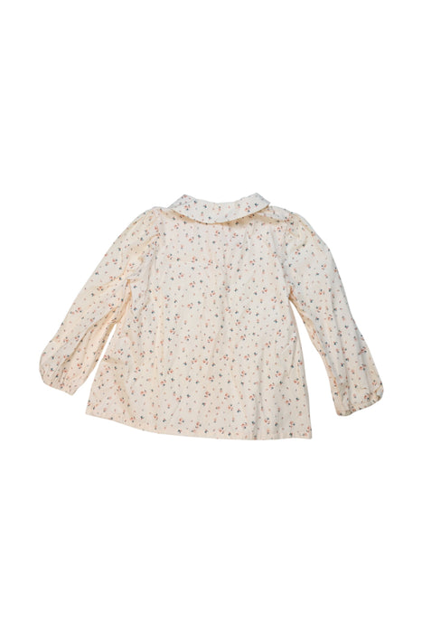 A Ivory Long Sleeve Shirts from Laranjinha in size 3T for girl. (Back View)