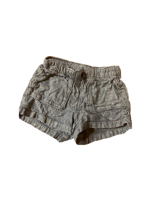 A Blue Shorts from Tea in size 4T for neutral. (Front View)