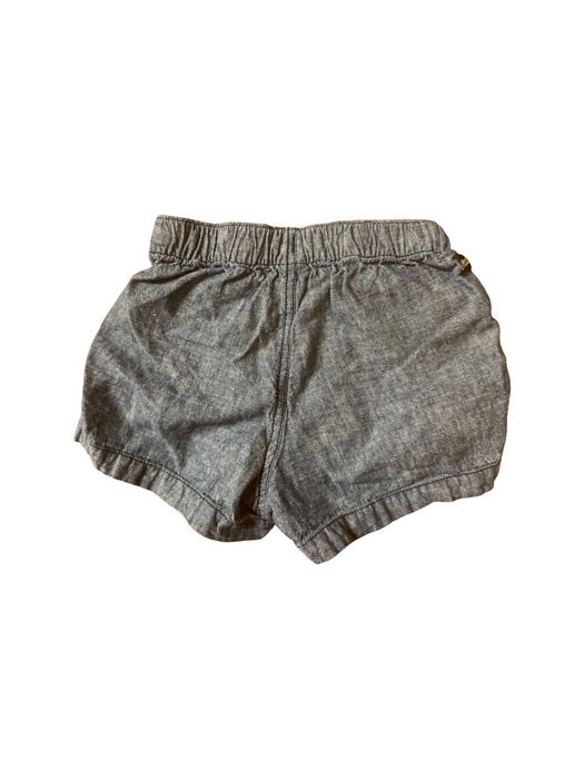 A Blue Shorts from Tea in size 4T for neutral. (Back View)