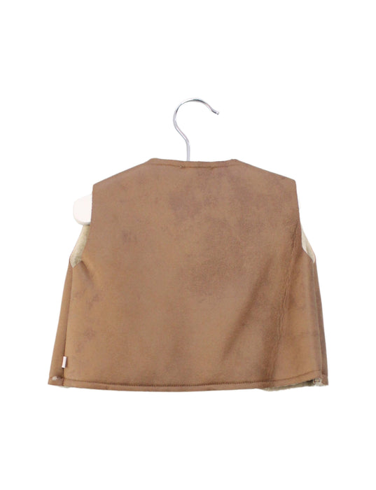 A Beige Vests from Les Enfantines in size 12-18M for girl. (Back View)