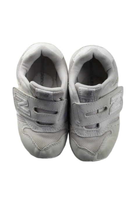 A White Sneakers from New Balance in size 18-24M for neutral. (Back View)