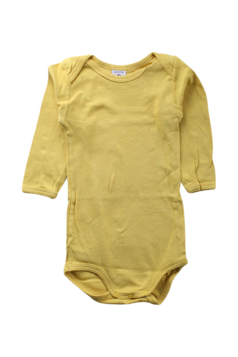 A Yellow Long Sleeve Bodysuits from Petit Bateau in size 3-6M for neutral. (Front View)