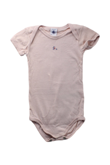 A Peach Short Sleeve Bodysuits from Petit Bateau in size 6-12M for neutral. (Front View)