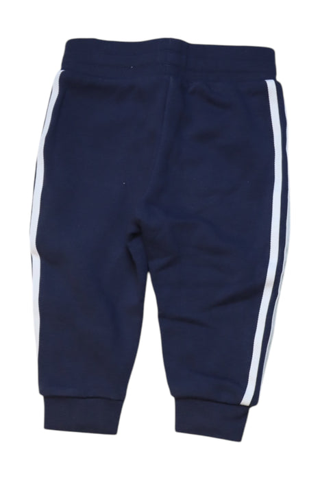 A Navy Sweatpants from Adidas in size 12-18M for boy. (Back View)