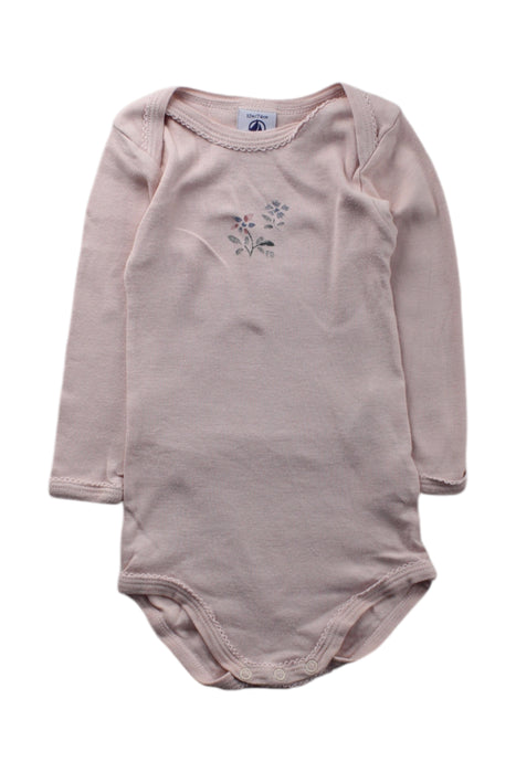 A Pink Long Sleeve Bodysuits from Petit Bateau in size 6-12M for neutral. (Front View)