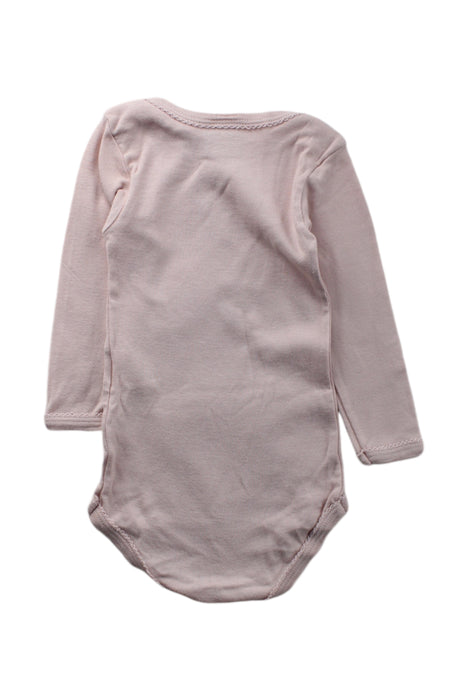 A Pink Long Sleeve Bodysuits from Petit Bateau in size 6-12M for neutral. (Back View)