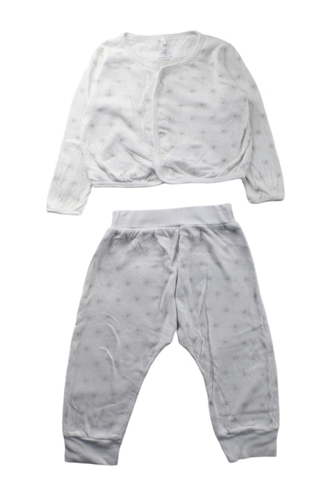 A White Pyjama Sets from Petit Bateau in size 12-18M for neutral. (Front View)