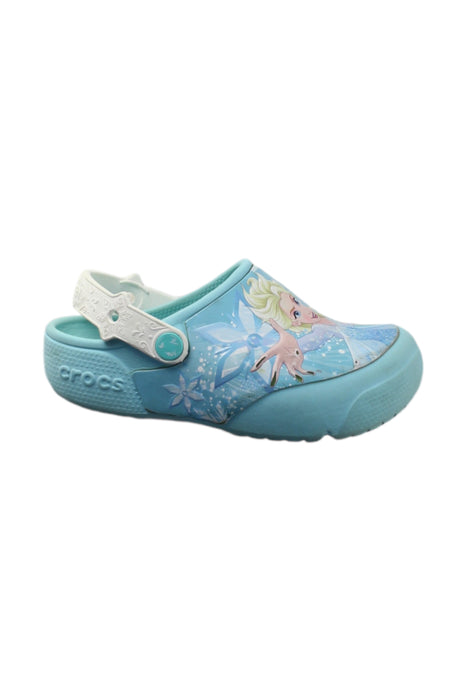 A Blue Slip Ons from Crocs in size 5T for girl. (Front View)