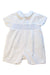 A White Short Sleeve Rompers from Sarah Louise in size 3-6M for girl. (Front View)