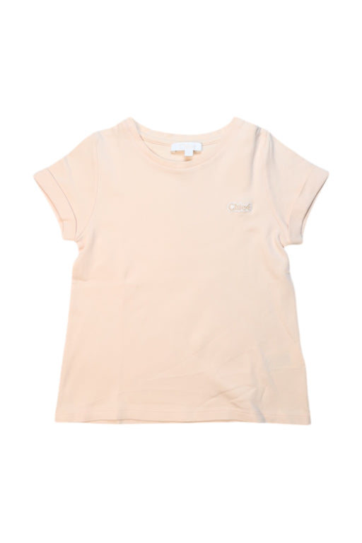 A Peach Short Sleeve T Shirts from Chloe in size 6T for girl. (Front View)