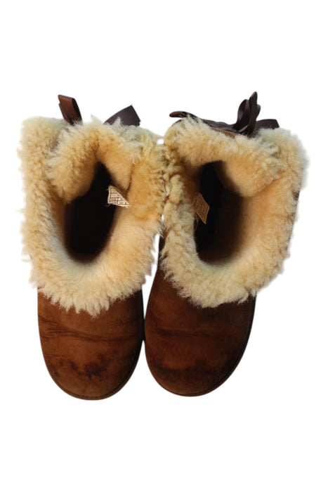 A Brown Winter Boots from UGG in size 10Y for girl. (Back View)