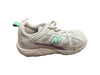 A White Sneakers from New Balance in size 4T for neutral. (Back View)