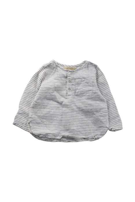 A Grey Long Sleeve Shirts from La Petite Collection in size 12-18M for neutral. (Front View)