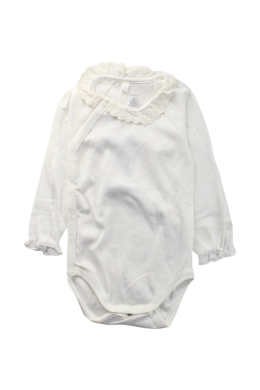 A White Long Sleeve Bodysuits from Petit Bateau in size 6-12M for neutral. (Front View)