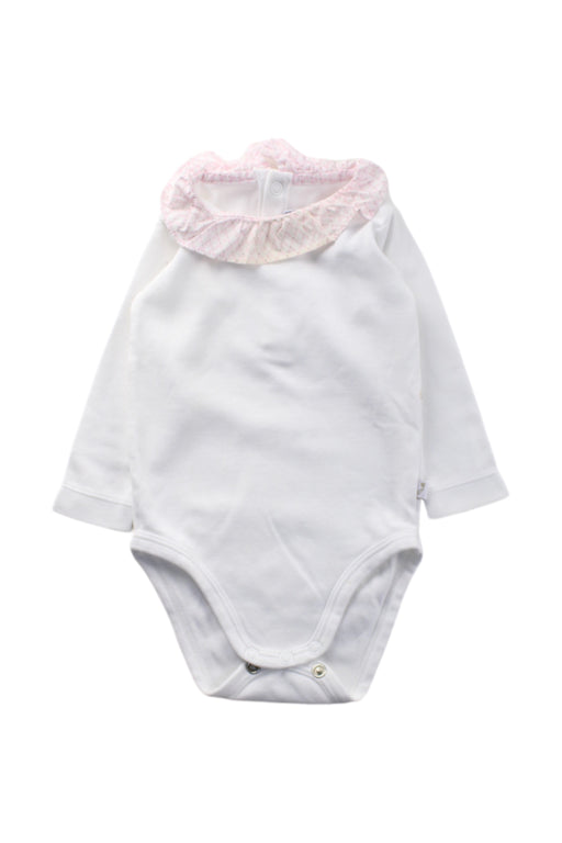 A White Long Sleeve Bodysuits from Jacadi in size 3-6M for neutral. (Front View)