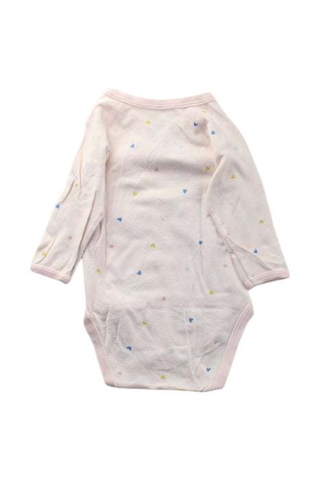 A Pink Long Sleeve Bodysuits from Petit Bateau in size 0-3M for neutral. (Back View)