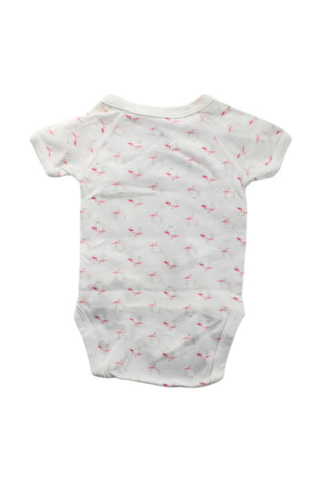 A White Short Sleeve Bodysuits from Petit Bateau in size Newborn for neutral. (Back View)