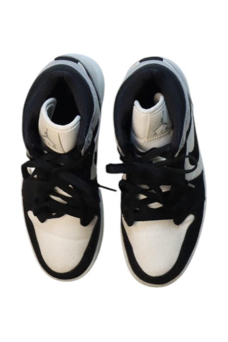 A Black Sneakers from Air Jordan in size 12Y for neutral. (Back View)