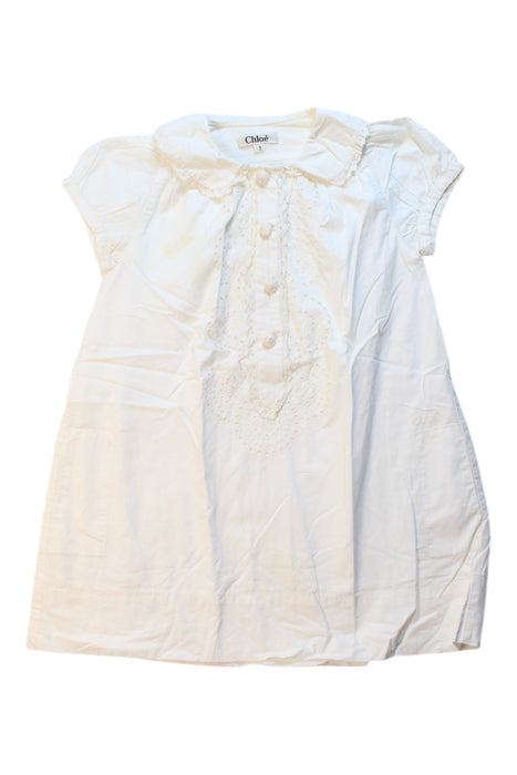 A White Short Sleeve Dresses from Chloe in size 3T for girl. (Front View)