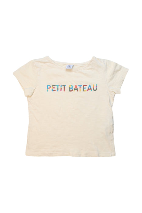 A Beige Short Sleeve T Shirts from Petit Bateau in size 6T for girl. (Front View)