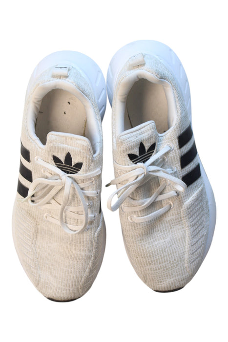 A White Sneakers from Adidas in size 11Y for boy. (Back View)