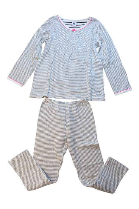A White Pyjama Sets from Petit Bateau in size 6T for girl. (Front View)