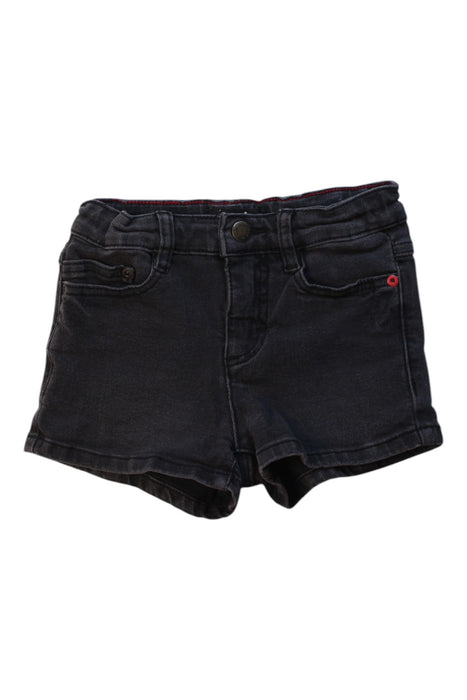 A Black Shorts from Molo in size 5T for girl. (Front View)