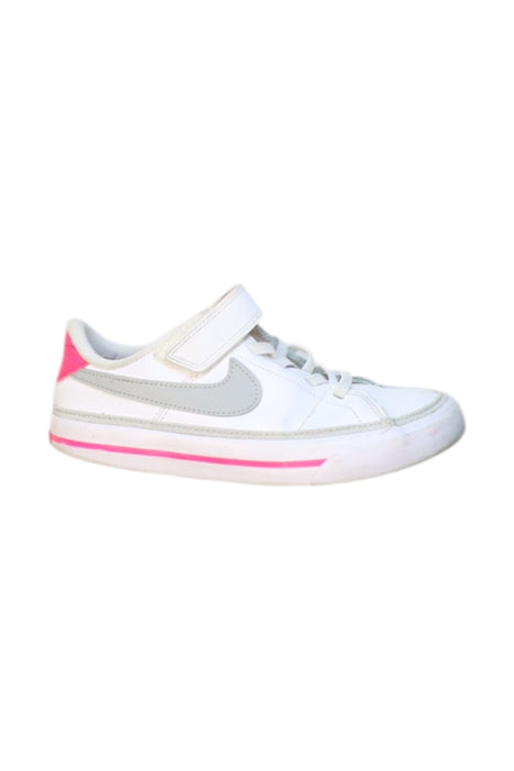 A White Sneakers from Nike in size 6T for girl. (Front View)
