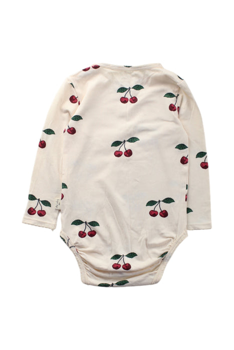 A Beige Long Sleeve Bodysuits from Konges Sløjd in size 6-12M for neutral. (Back View)