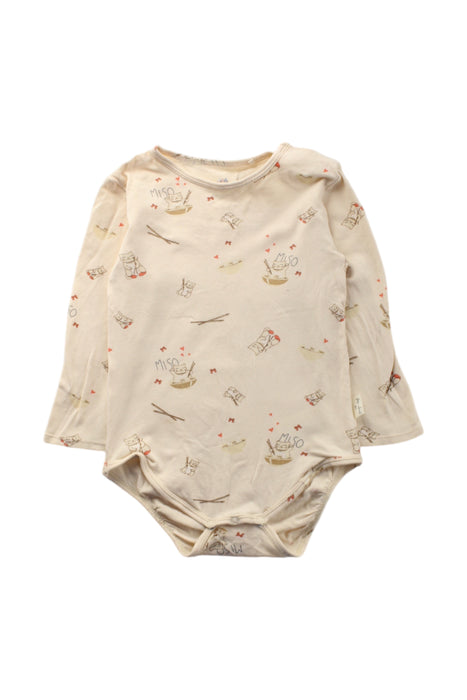 A Beige Long Sleeve Bodysuits from Konges Sløjd in size 6-12M for neutral. (Front View)