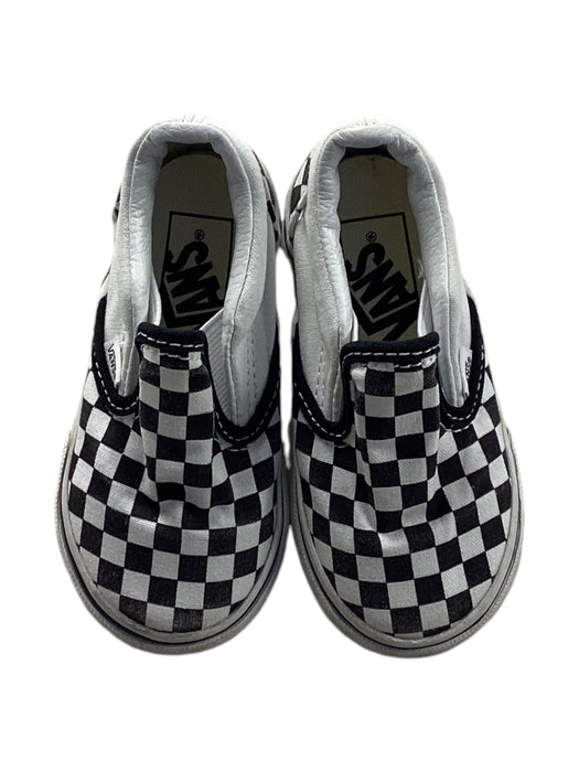 A Black Slip Ons from Vans in size 18-24M for neutral. (Back View)