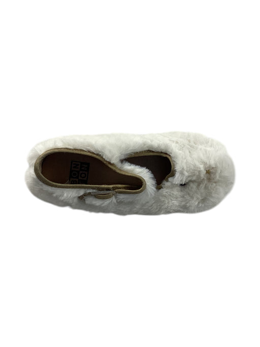 A White Slippers from Bonton in size 4T for girl. (Front View)