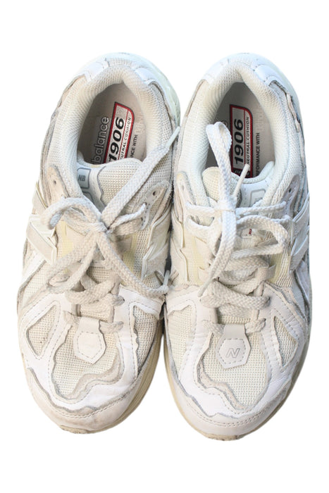 A White Sneakers from New Balance in size 12Y for neutral. (Back View)