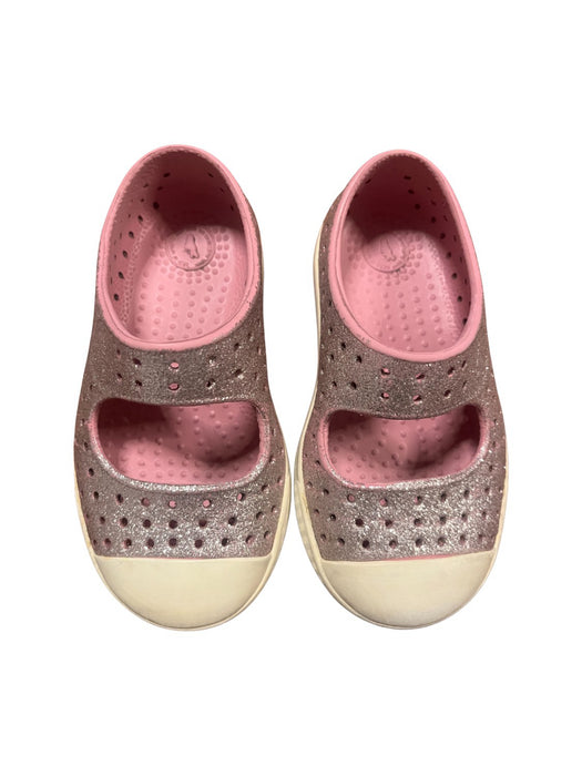 A Pink Aqua Shoes from Native Shoes in size 12-18M for girl. (Front View)