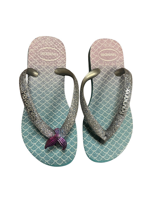 A Teal Flip Flops from Havaianas in size 4T for girl. (Front View)