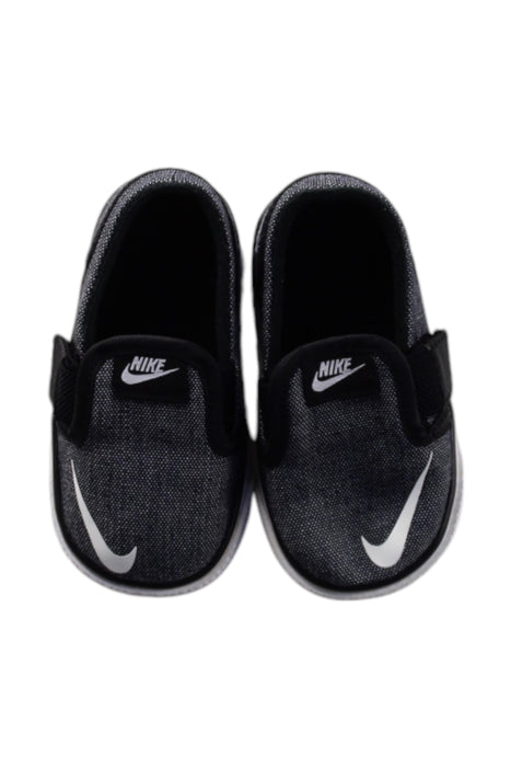 A Black Slip Ons from Nike in size 12-18M for neutral. (Back View)