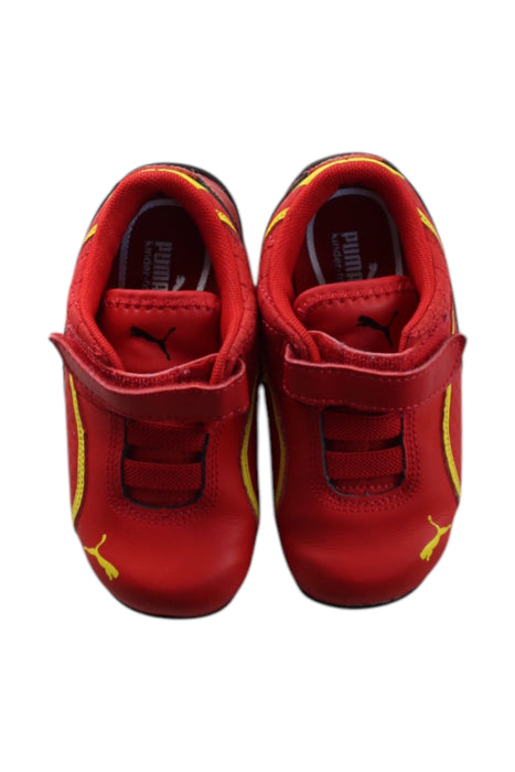 A Red Sneakers from Puma in size 18-24M for boy. (Back View)