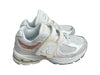 A White Sneakers from New Balance in size 6T for neutral. (Front View)