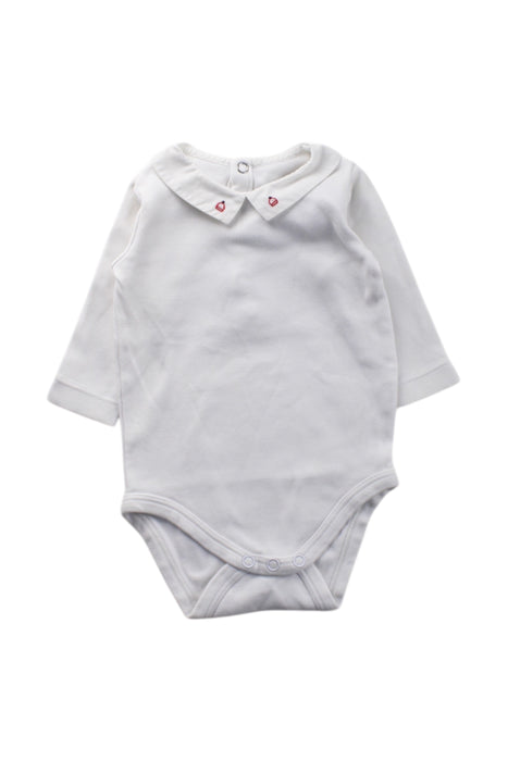 A White Long Sleeve Bodysuits from Jacadi in size 0-3M for neutral. (Front View)
