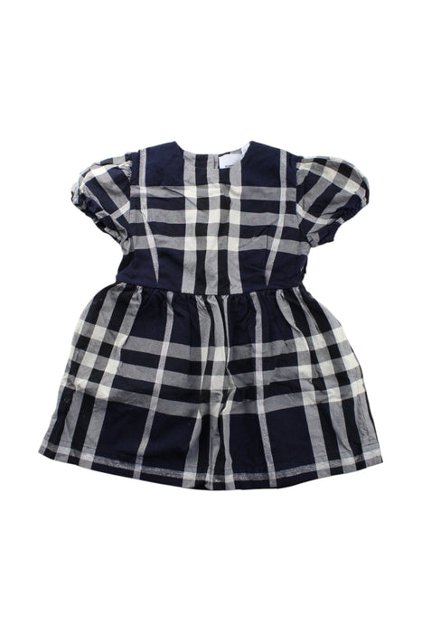 A Navy Short Sleeve Dresses from Burberry in size 4T for girl. (Front View)