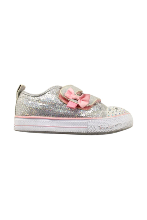A Silver Sneakers from Skechers in size 3T for girl. (Front View)