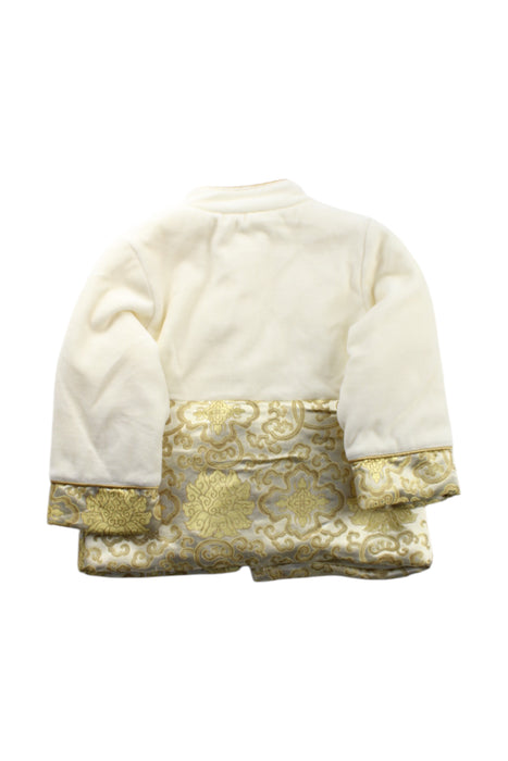 A Ivory Coats from Mides in size 3T for neutral. (Back View)