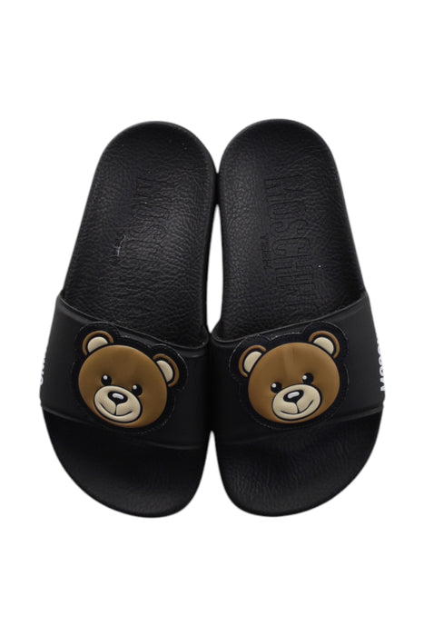 A Black Sandals from Moschino in size 6T for neutral. (Back View)