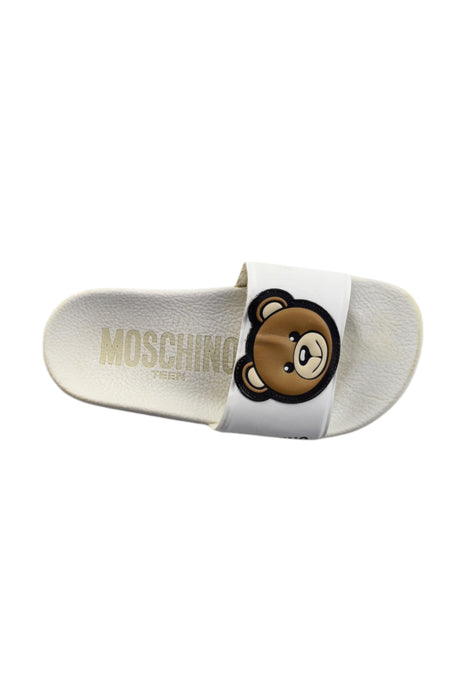 A White Sandals from Moschino in size 6T for neutral. (Front View)
