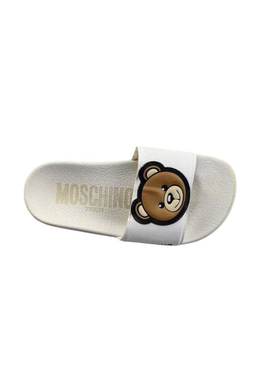 A White Sandals from Moschino in size 6T for neutral. (Front View)