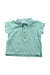 A Green Short Sleeve Polos from Nanos in size 12-18M for neutral. (Front View)