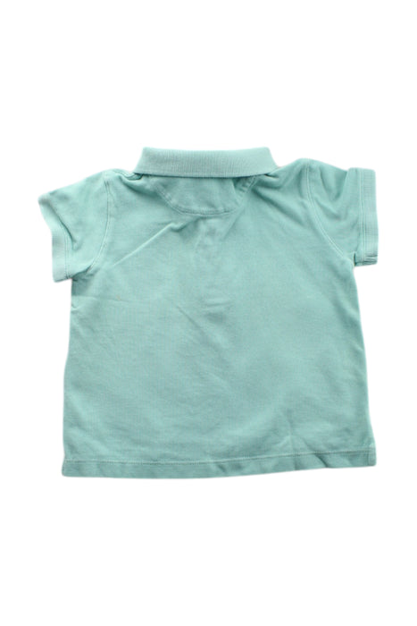 A Green Short Sleeve Polos from Nanos in size 12-18M for neutral. (Back View)