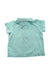 A Green Short Sleeve Polos from Nanos in size 12-18M for neutral. (Back View)