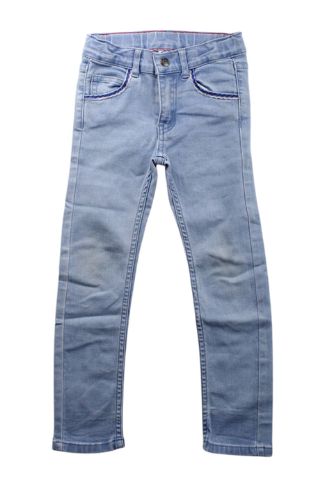 A Blue Jeans from La Compagnie des Petits in size 6T for girl. (Front View)